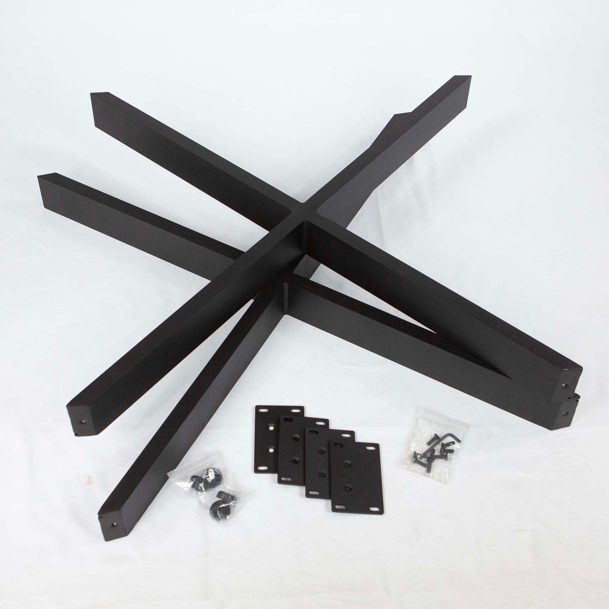 black wishbone table base with mounting plates and hardware for tabletop installation