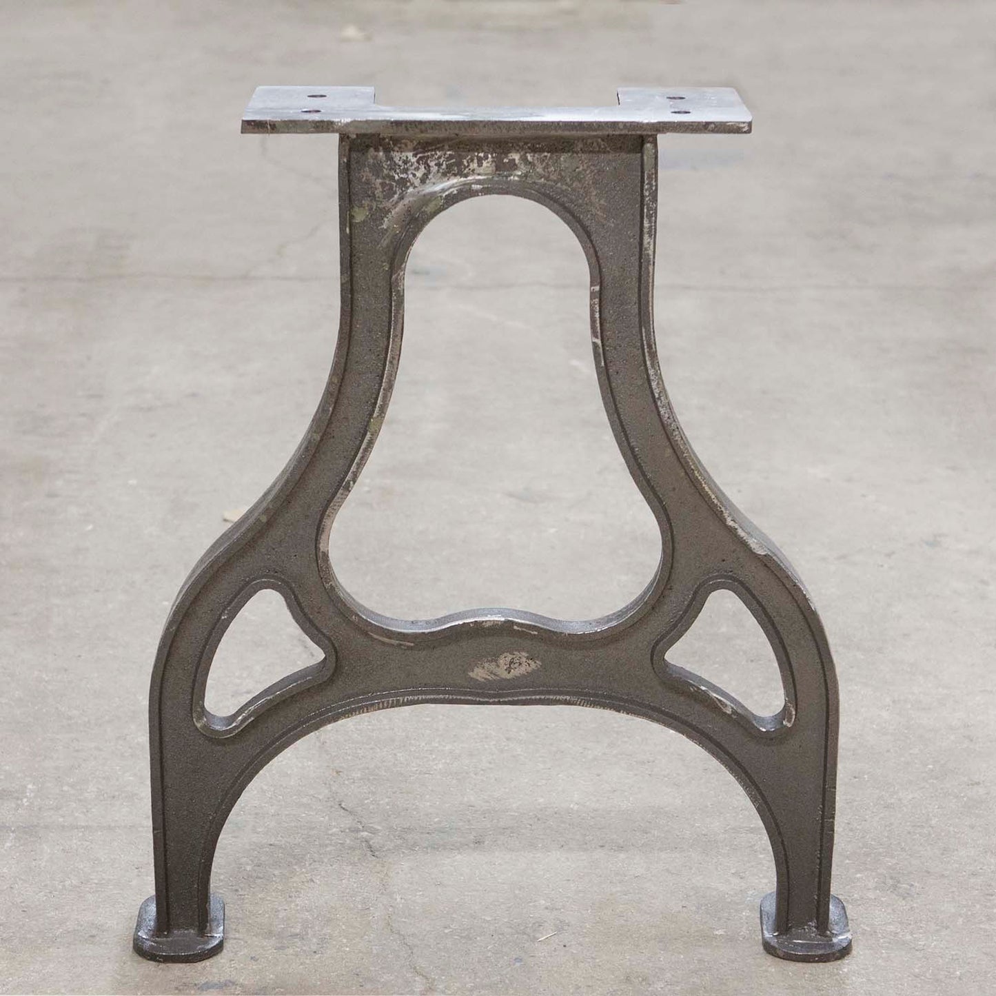 Front view of CAST11 cast iron table leg with classic industrial design and curved profile