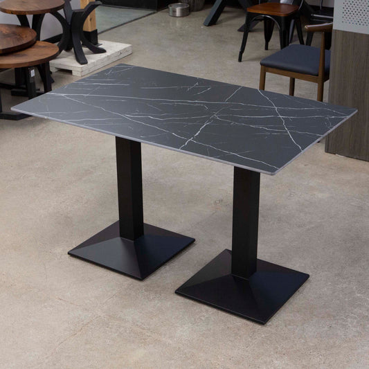 black sintered stone restaurant tables
