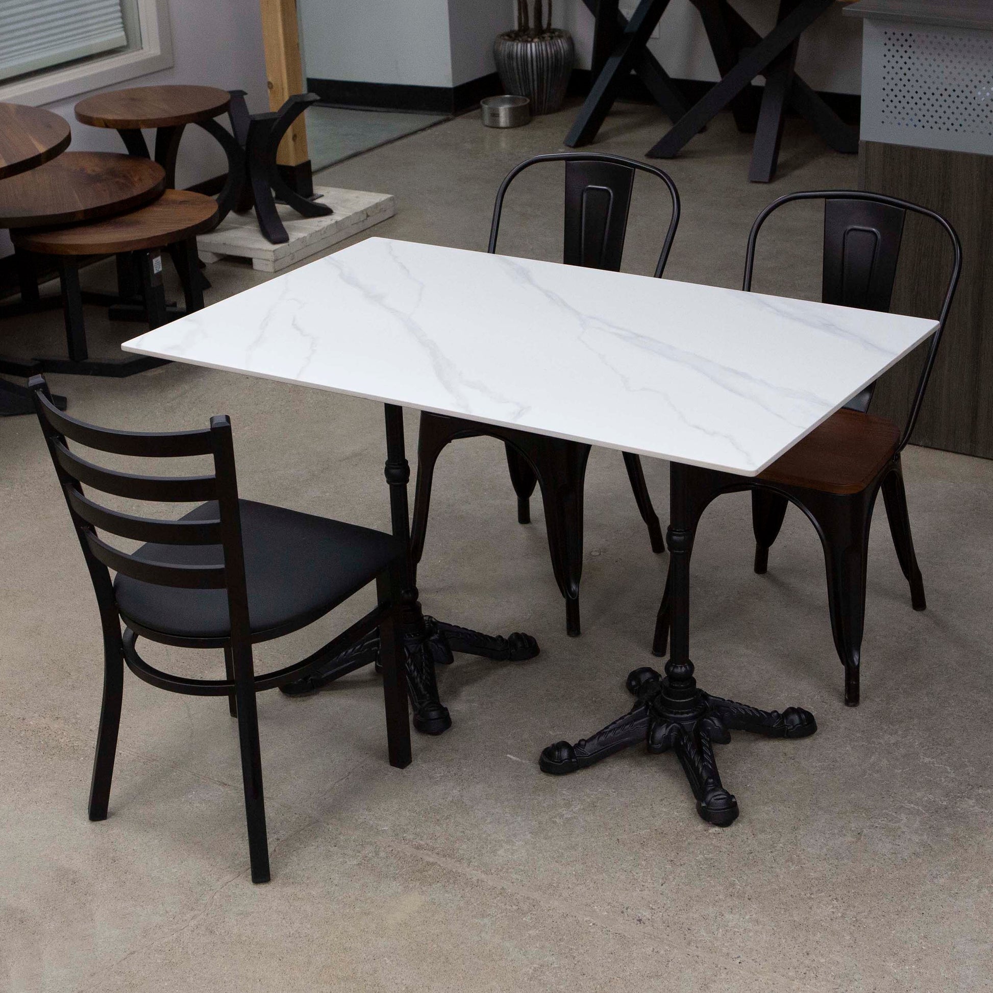 white sintered stone restaurant tables and chairs