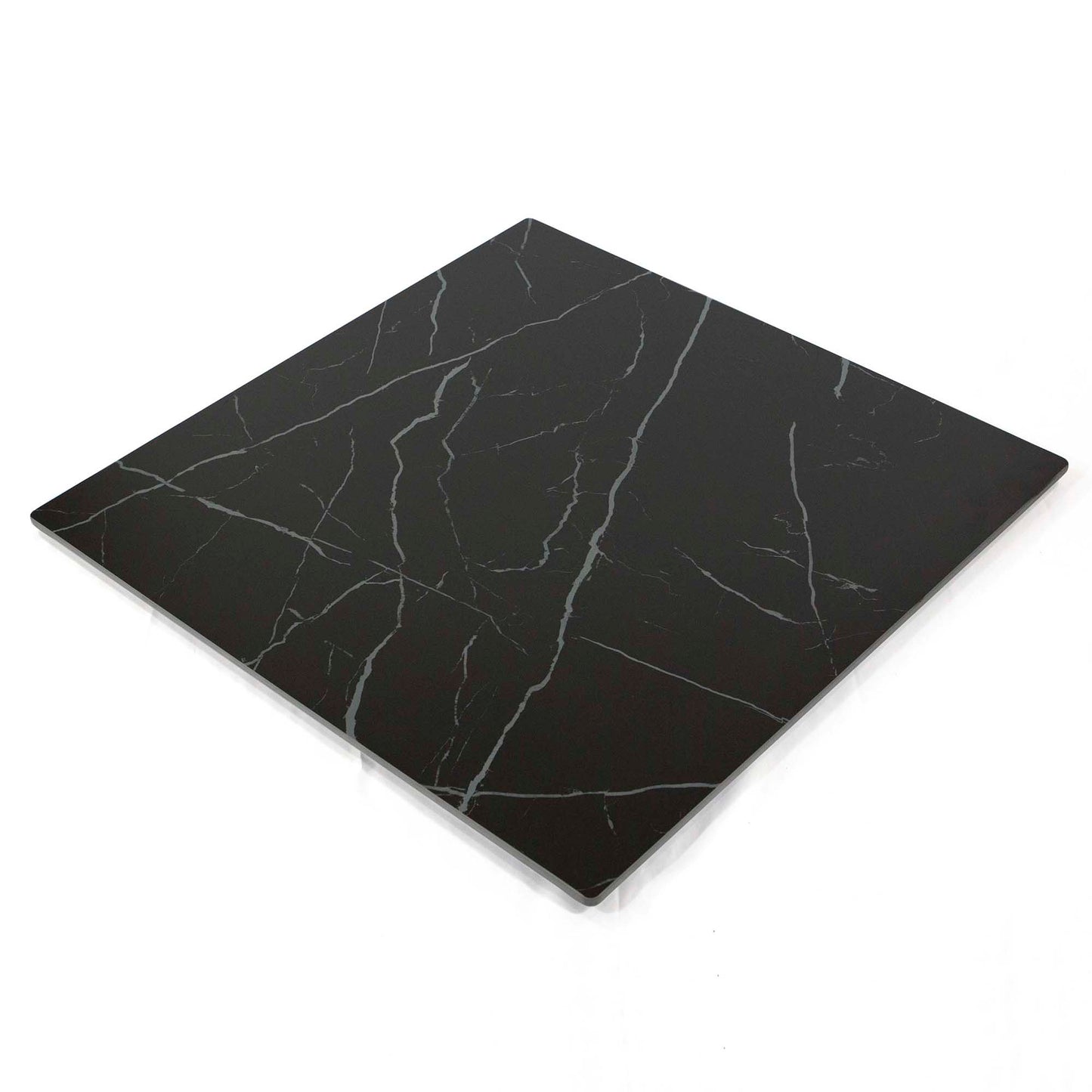 Black marble-patterned cutting board on a white background