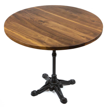restaurant table with black walnut top and cast iron base