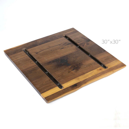 underside of square black walnut tabletop with steel reinforcement channels