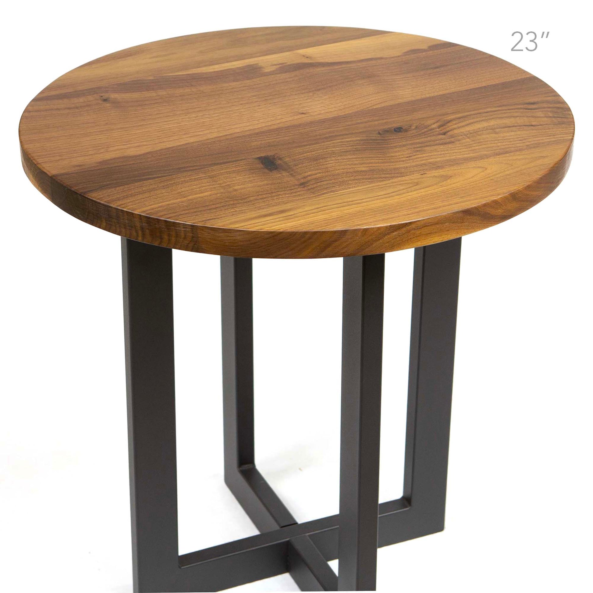 23 inch round black walnut tabletop installed on modern metal table base