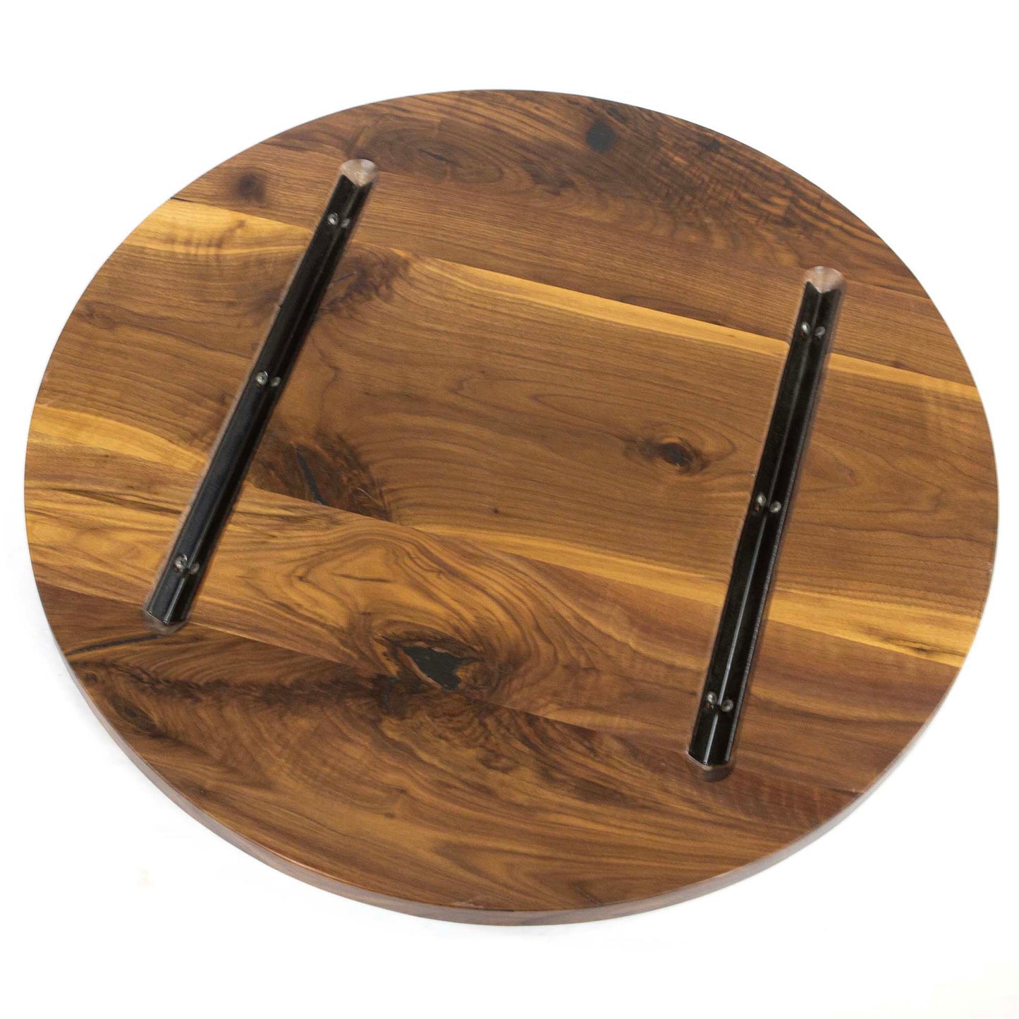 underside of 30 inch round black walnut tabletop with steel reinforcement channels