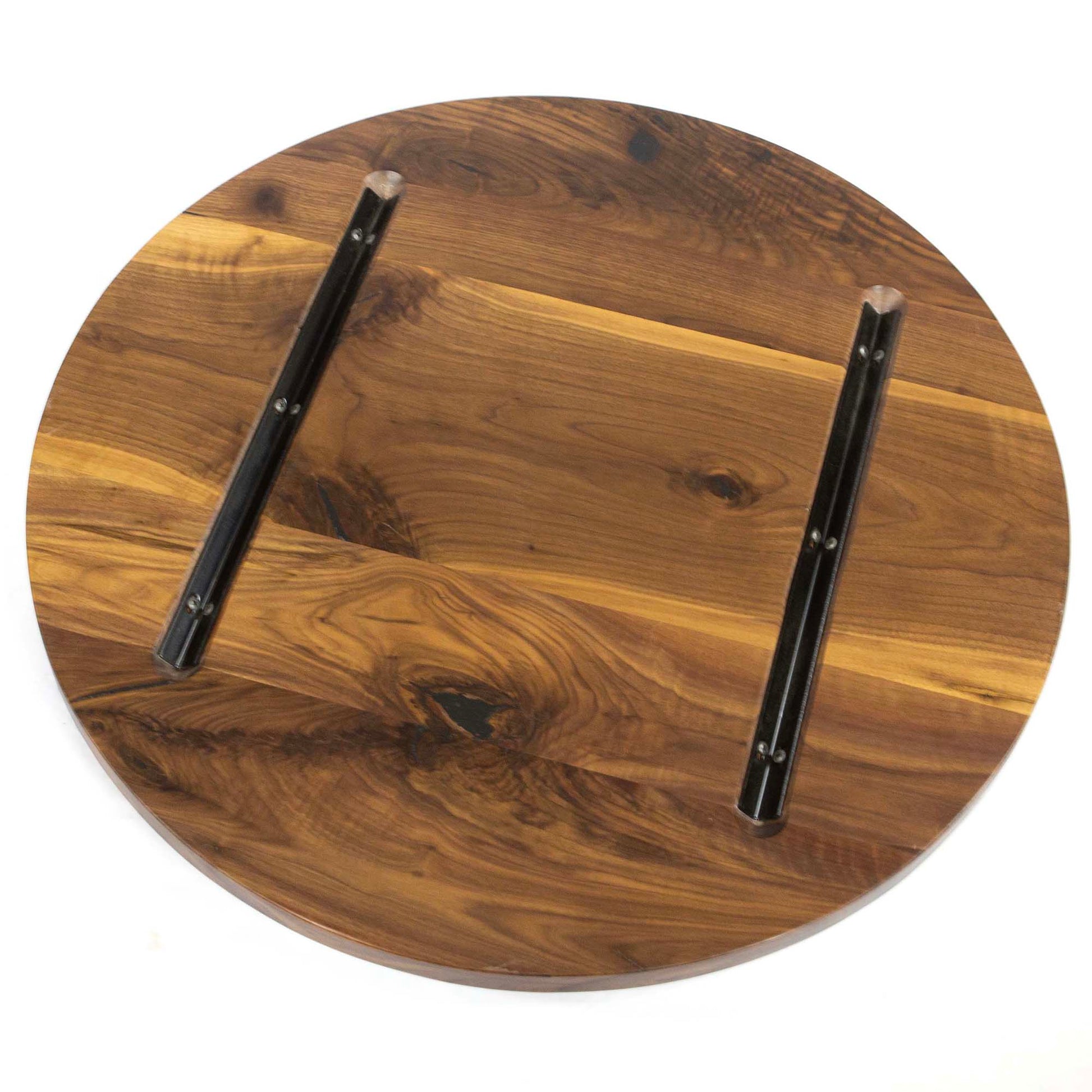 underside of 30 inch round black walnut tabletop with steel reinforcement channels